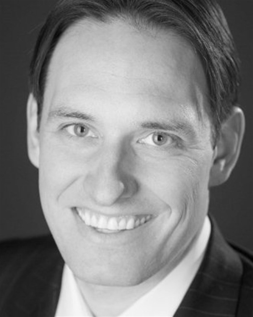 Portrait of Jeffery J. Fiedler, third-generation Broker of Record.